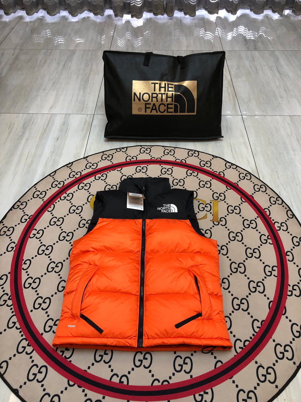 The North Face Orange & Black Colorblock Puffer Vest