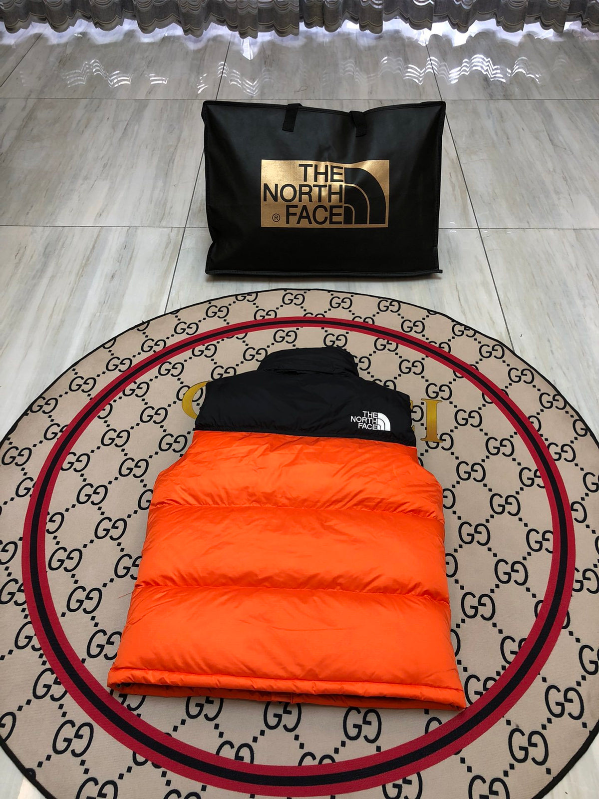 The North Face Orange & Black Colorblock Puffer Vest