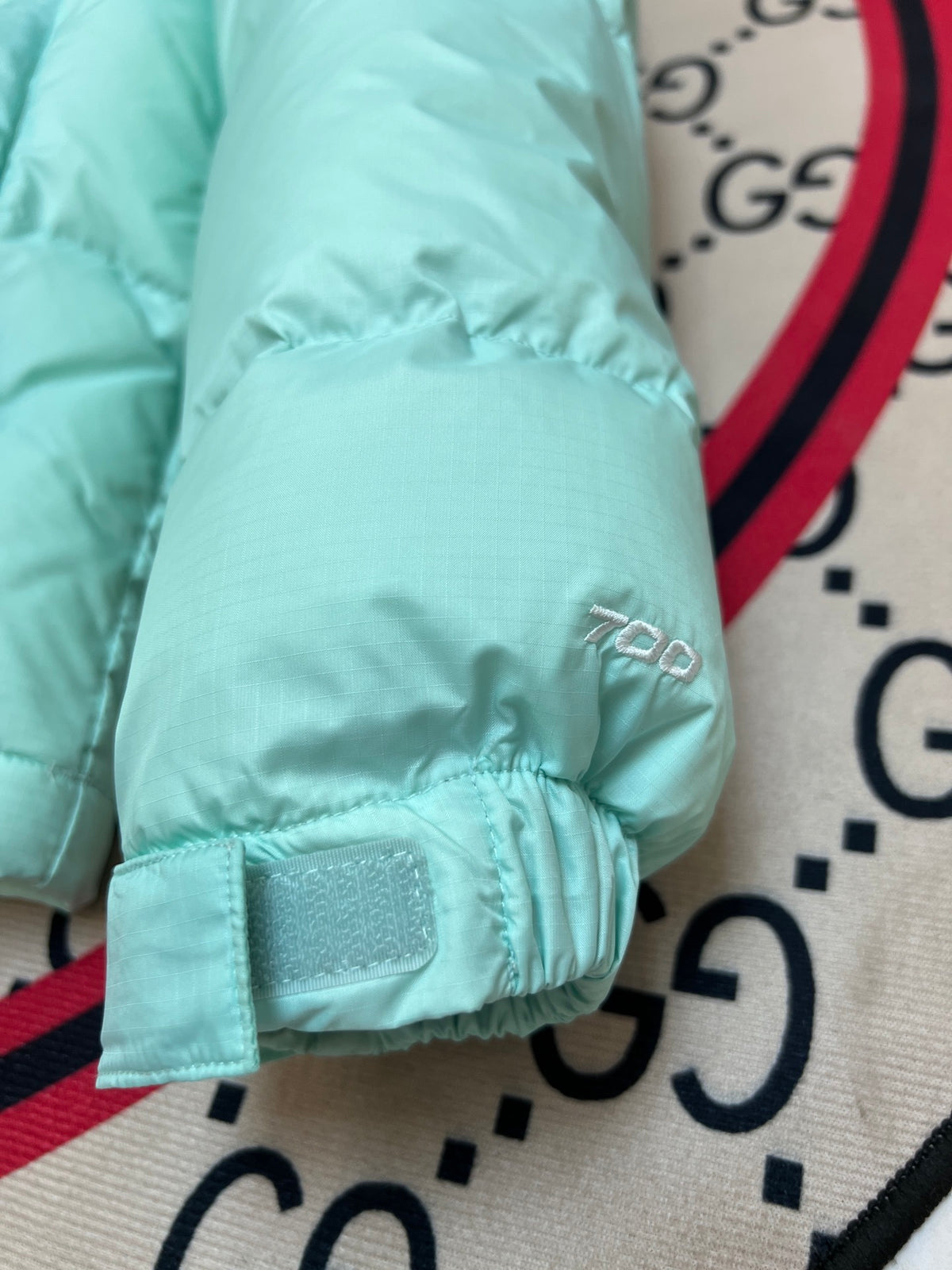 The North Face Mint Green & Black Colorblock Puffer Jacket