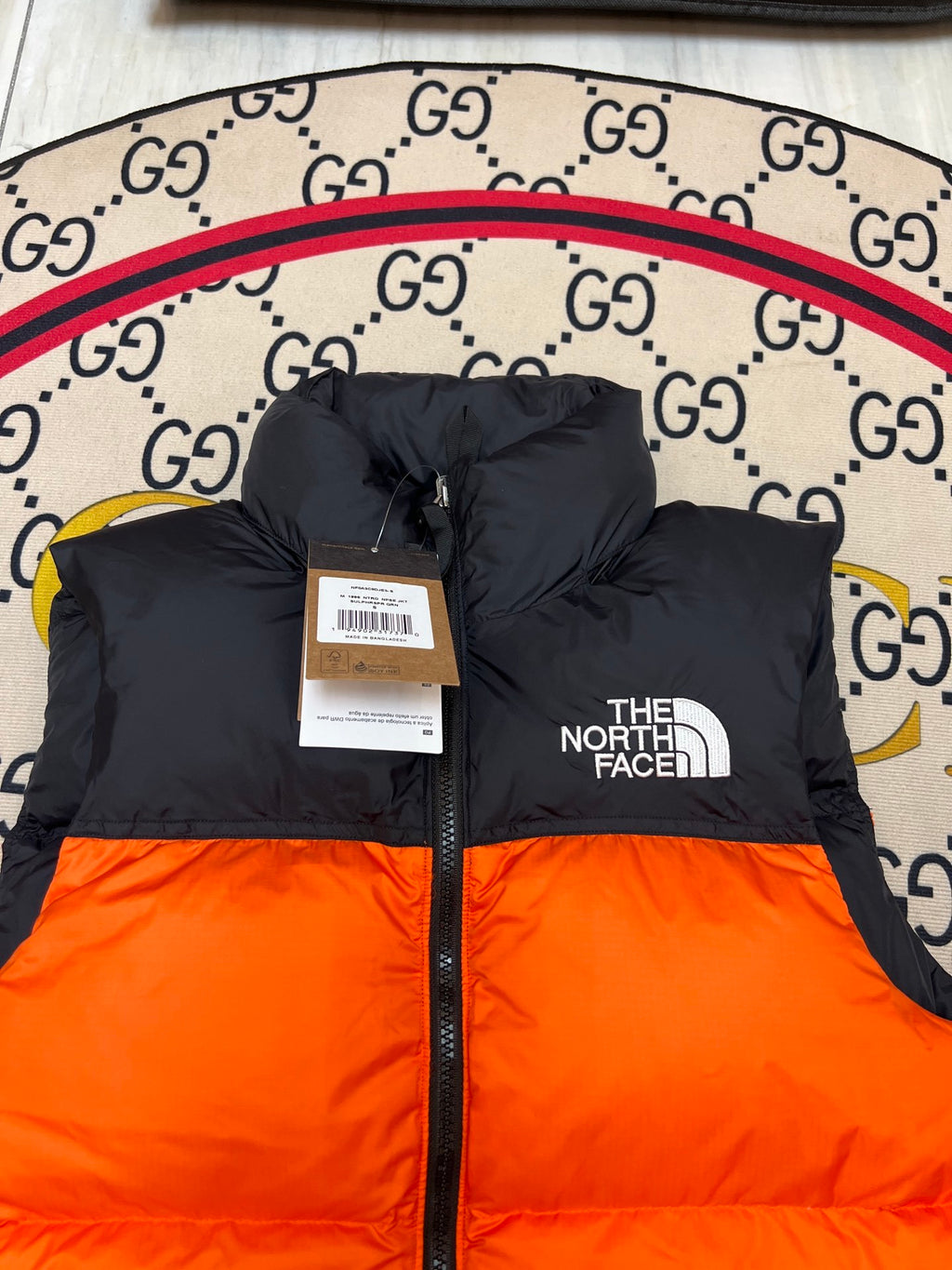 The North Face Orange & Black Colorblock Puffer Vest